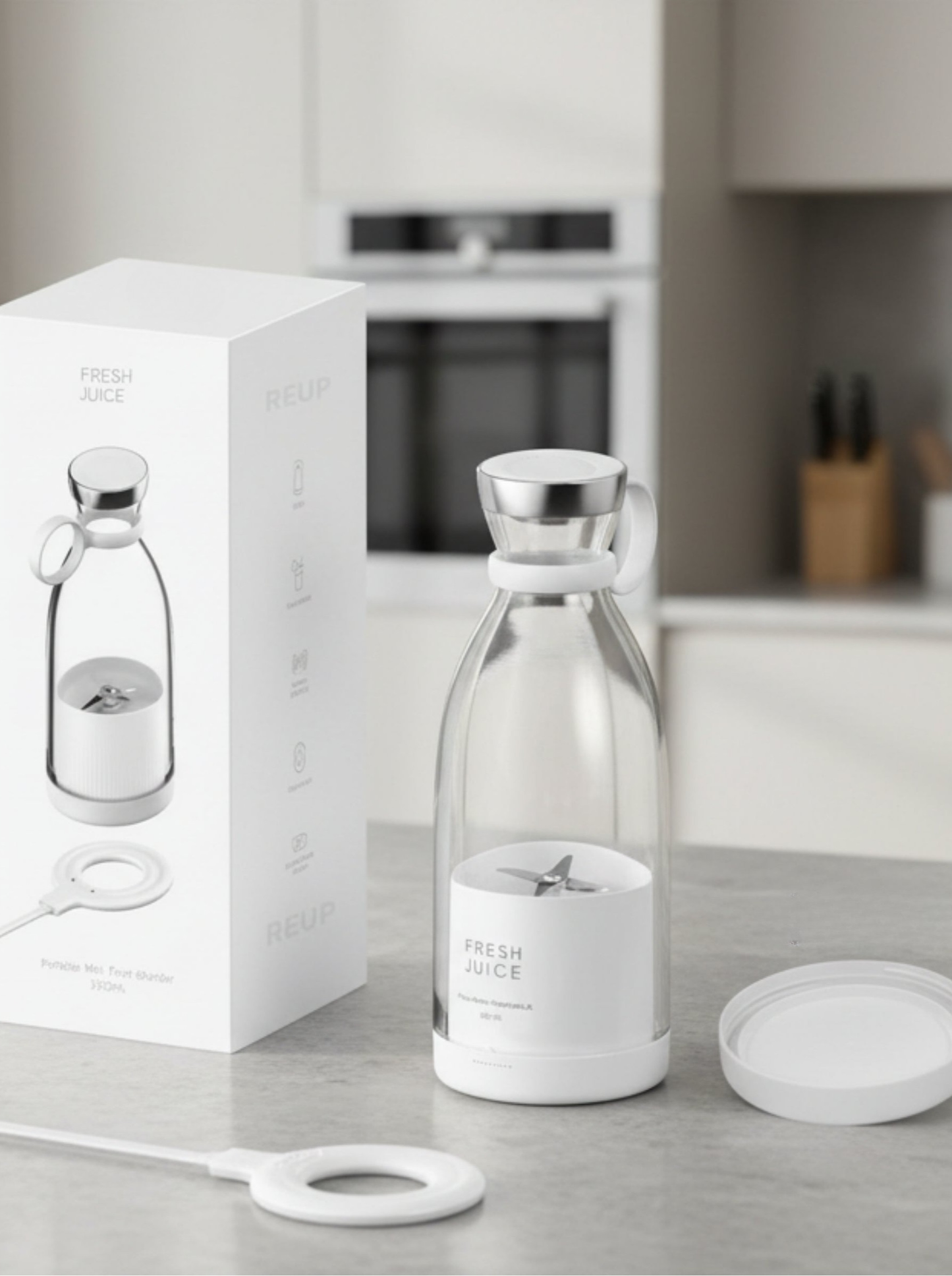 Blender portable Fresh Juice Blanc Minéral déballé avec sa boîte dans une cuisine moderne